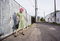 Free Woman With Pink Hair And A Purse In An Alley Stock Photos - 6004543