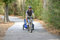 Free Man On Bike Pulling Trailer Royalty Free Stock Image - 6040506