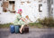 Free Woman With Pink Hair And A Small Siuitcases Royalty Free Stock Photography - 6040597