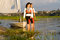 Free Couple Next To Sailboat On Water - Horizontal Stock Photos - 6040823