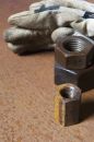 Free Dirty Gloves And Nuts Royalty Free Stock Photo - 616945