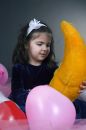 Free Sweet Young Girl Playing With Her Plush Moon Stock Photography - 619372