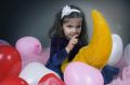 Free Sweet Young Girl Playing With Her Plush Moon Stock Images - 619374
