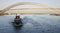 Free Tugboat With Golden Arch Bridge Royalty Free Stock Photography - 6185137