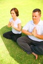 Free Two Caucasian Meditate On Grass Royalty Free Stock Photo - 6209335