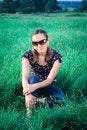 Free Girl Sitting In Grass Stock Photo - 6282380
