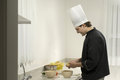 Free Chef Peeling Potatoes Royalty Free Stock Photo - 6340825