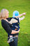 Free Mother Keeps Child In Her Arms And Points To Somet Royalty Free Stock Images - 6375719