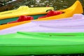 Free Coloured Canoes Ashore Of The Lake Stock Photos - 6488323