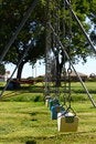 Free Lonely Row Of Swings Stock Images - 6492414