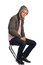 Free Young Man In Jacket With Fur Sits On Stool Stock Photos - 6525373
