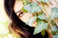 Free Woman Behind Leaves Stock Photos - 6533713