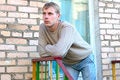 Free Young Stylish Man Stay On Stairs Near Brick Wall. Royalty Free Stock Photography - 6558247