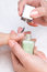 Free Applying Manicure, Moisturizing The Nails Stock Photography - 6556272