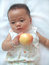 Free Pretty Baby And Red Apple Royalty Free Stock Photography - 6557877