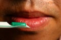 Free Green Pill Near Mouth Royalty Free Stock Images - 6583369