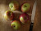 Free Apples And Knife On Old Chopping Board. Stock Images - 6585334