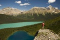 Free Young Man Standing On Boulder Above Lakes Stock Image - 6595751