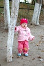 Free Pretty Little Girl Stay Behind Tree. Stock Photo - 6652050
