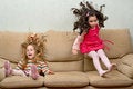 Free Two Little Girls Jumping On Sofa Royalty Free Stock Images - 6679979