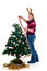 Free Happy Girl Decorating Christmas Tree Stock Photography - 6684032