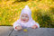 Free Smiling Baby With Yellow Leaf Stock Photo - 6764660