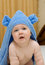 Free Smiling Baby In Blue Towel On Bed 12 Royalty Free Stock Image - 6764676