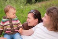 Free Parents With Baby On Nature Stock Image - 6791981