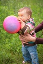 Free Mother Hold Baby With Ball Royalty Free Stock Image - 6792096