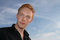 Free Wide-eyed Young Man Against Blue Sky Royalty Free Stock Photo - 6804735