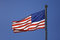 Free USA Flag Against Blue Sky Royalty Free Stock Photos - 6813068