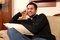 Free Man Is Sitting In Sofa Royalty Free Stock Photography - 6843437