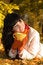Free Young Woman With Tea Cup In The Autumn Park Royalty Free Stock Photos - 6895448