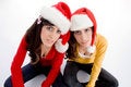 Free Sitting Females With Christmas Hat Stock Photography - 7026102