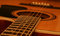 Free Acoustic Guitar Body And Fret Board Close Up. Royalty Free Stock Image - 7035986