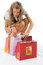 Free Happy Young Woman Looking At The Bags Royalty Free Stock Image - 7051976