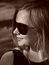 Free Young Woman With Sun Glasses In Sepia Royalty Free Stock Images - 7618359