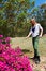 Free Woman Watering Bugonvia Flowers Stock Photo - 7726200