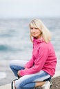 Free Woman Relaxing Near The Ocean Royalty Free Stock Image - 7772676