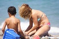 Free Mother And Son Playing In The Sand Stock Photos - 797313