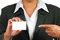 Free Businesswoman In Suit Holding Empty Business Card Royalty Free Stock Photos - 7904468