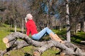 Free Girl Sunning On Fallen Oak Royalty Free Stock Photography - 7980547