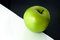 Free Granny Smith Apple On Artistic Background Royalty Free Stock Image - 809116