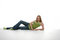 Free Pretty Young Woman In Green Reclining On Floor Royalty Free Stock Photography - 8006197