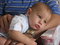 Free Lying In Daddy S Arms Royalty Free Stock Photography - 8069527