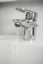 Free Water Tap With Focus On Water Coming Out Of Tap Royalty Free Stock Photos - 8136108