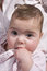 Free Baby Eating Her Dress Royalty Free Stock Image - 8130166