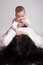 Free Baby On Top Of Mom Royalty Free Stock Photos - 8130228