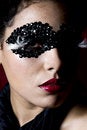 Free Attractive Young Woman Wearing A Black Gem Mask Stock Photo - 829860