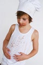 Free Young Baker Boy Eating Chocolate Royalty Free Stock Images - 8218909